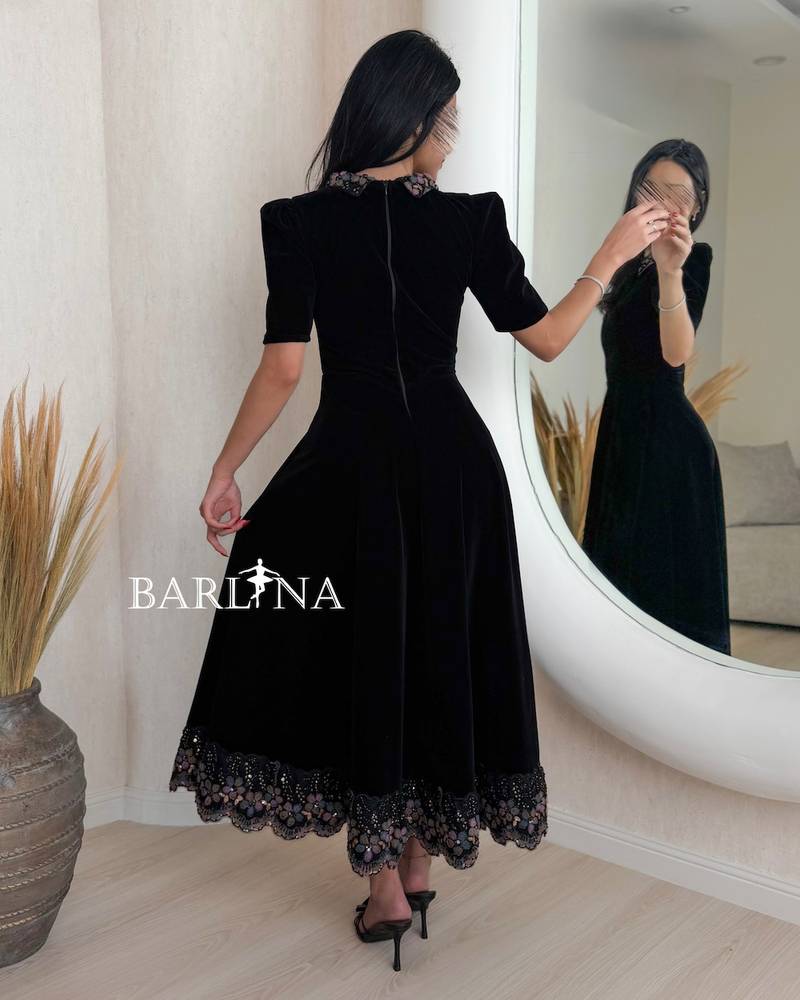 Black velvet dress with mid-length sleeves