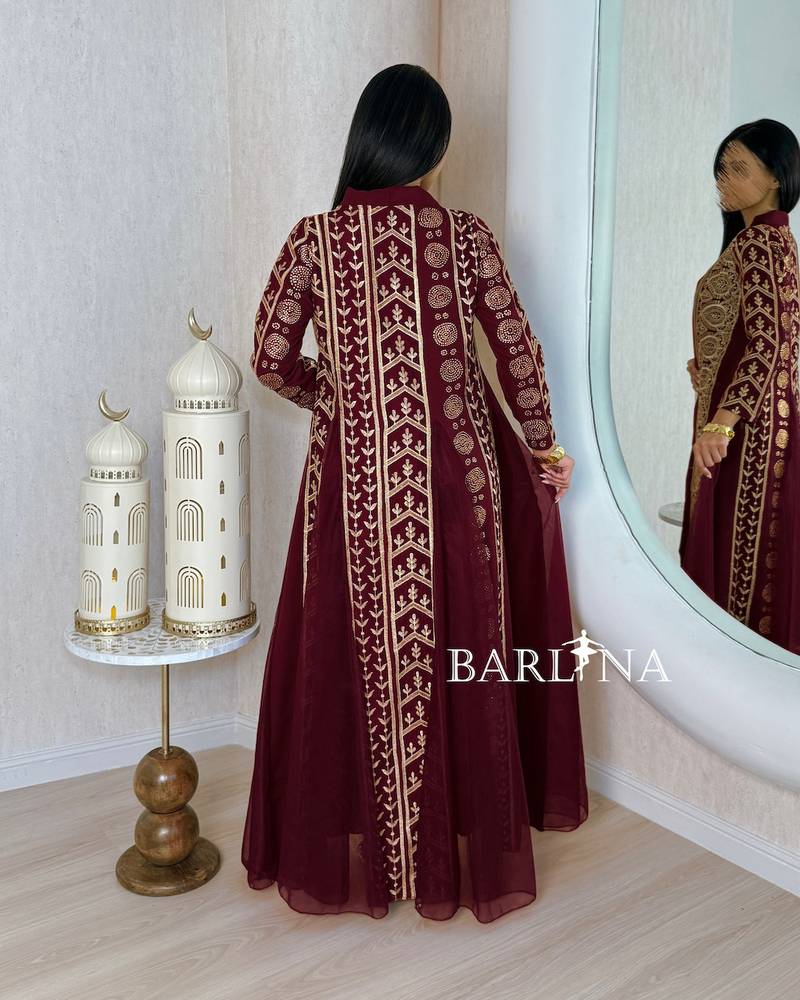 Red jalabiya with gold embroidery and an open cut