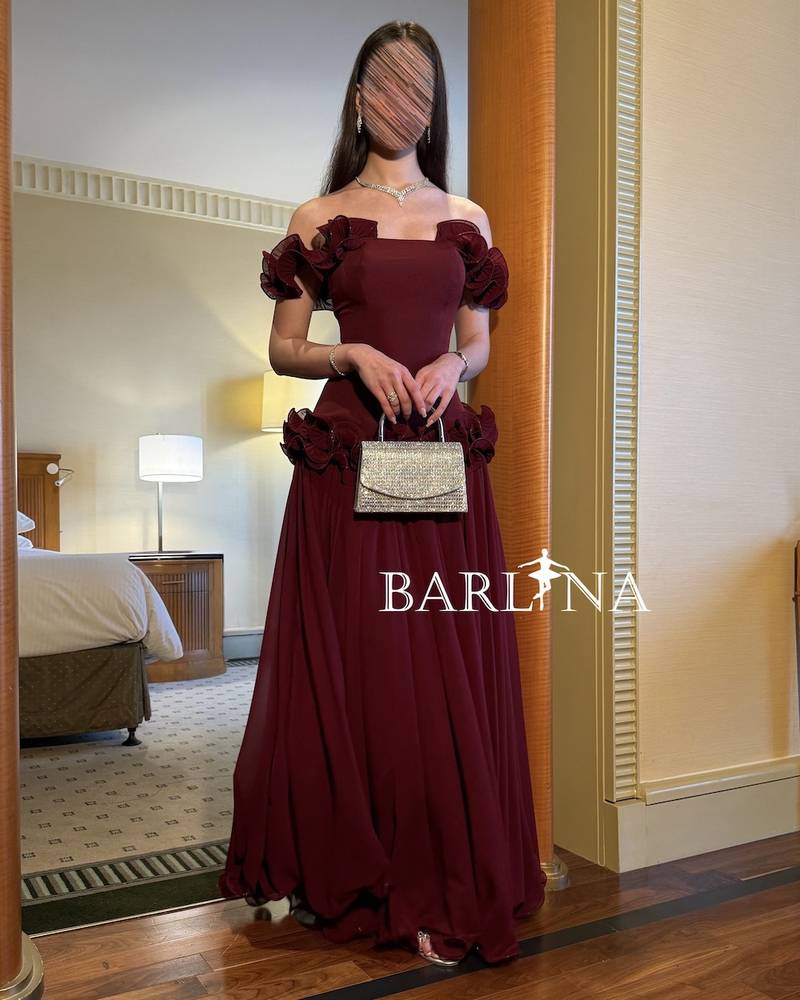 Off-shoulder burgundy dress with delicate floral details