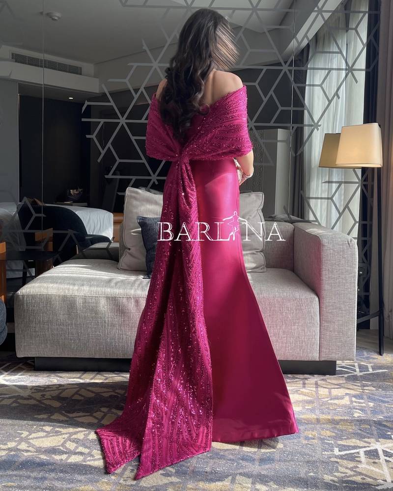 Fuchsia dress with a bow tail