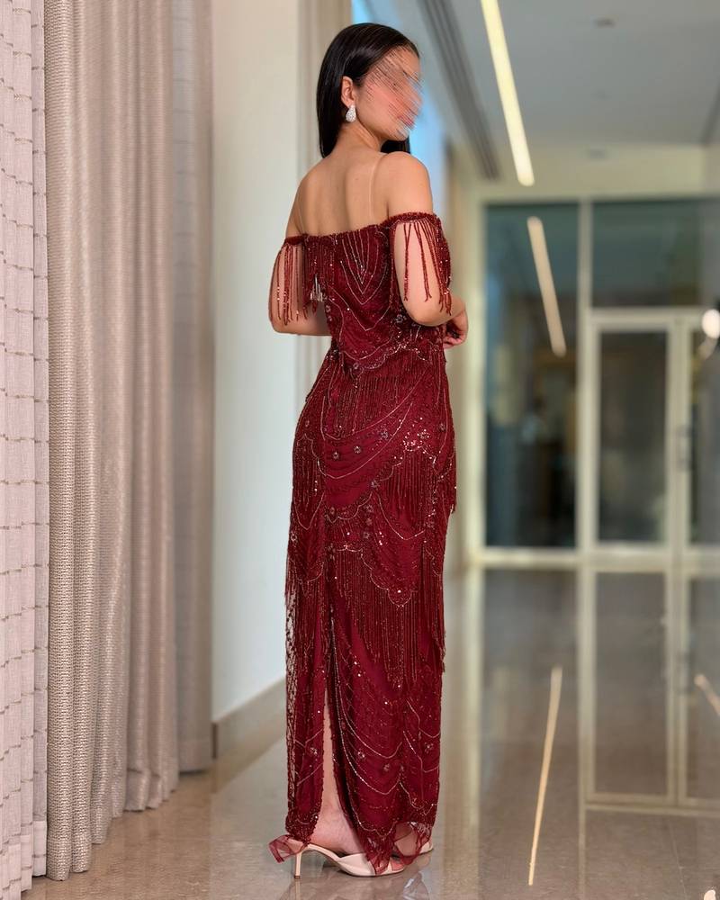 Elegant burgundy evening dress with dangling beads