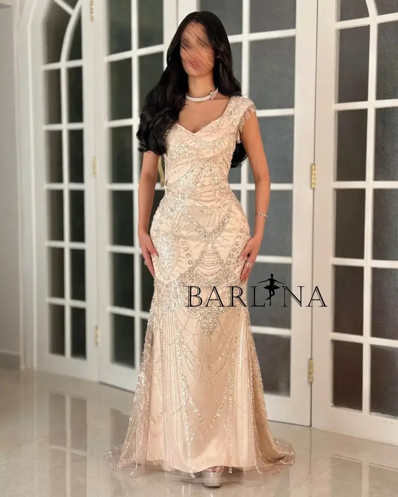 Beige evening dress embroidered with matching sequins