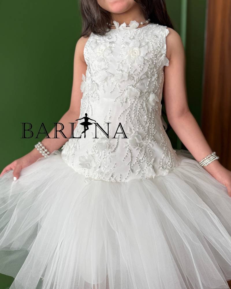 White girl's dress with elegant embroidery