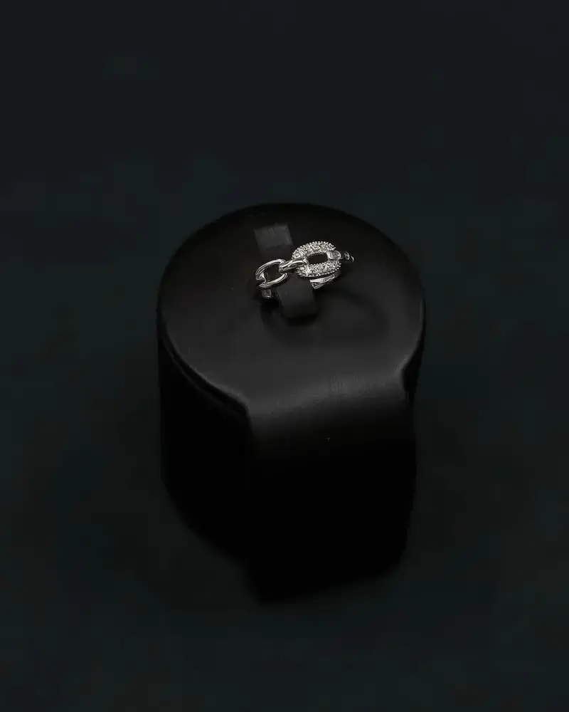 A delicate bracelet and ring with an interlocking ring design
