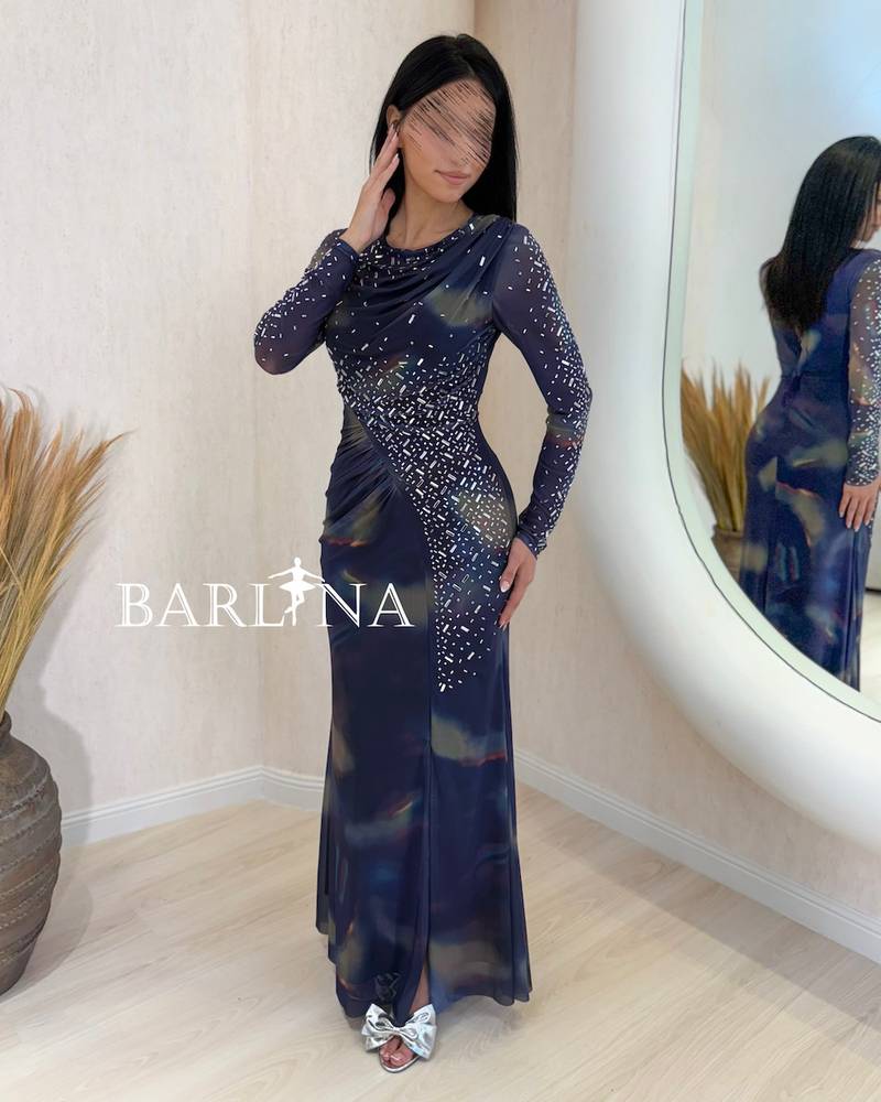 A soft blue dress with scattered shimmering embroidery