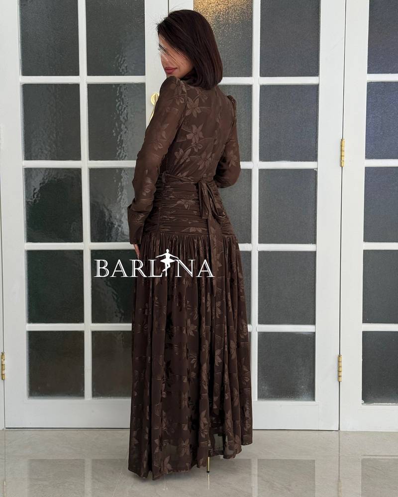A soft chocolate brown dress with a delicate floral pattern