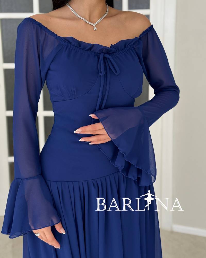 Soft blue dress with pleats and sheer sleeves