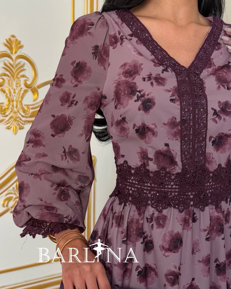 A mauve dress with a floral print and crochet details