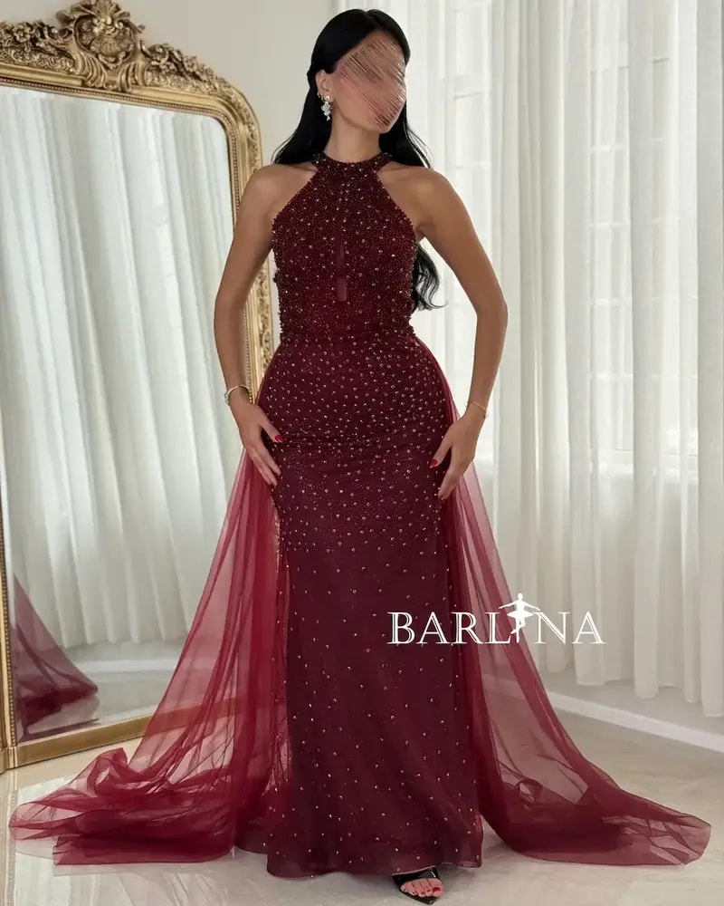 Burgundy embroidered evening dress with a train