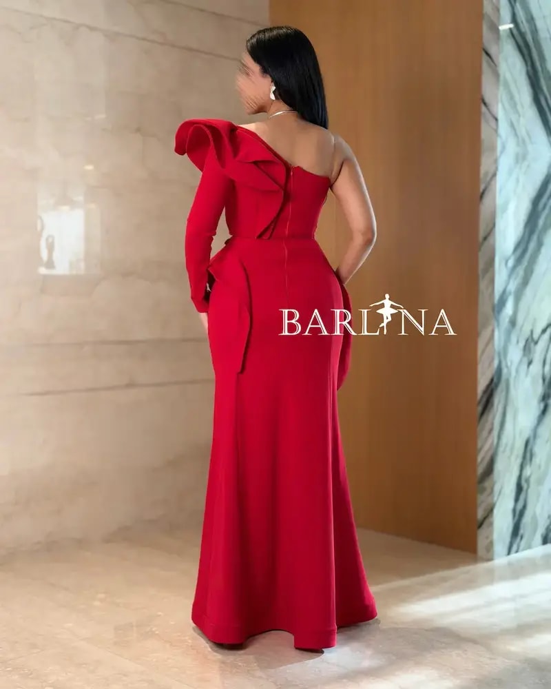 Red dress with a fitted design and front slit