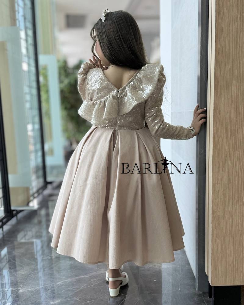 Beige girls' dress with a soft sequined sheen