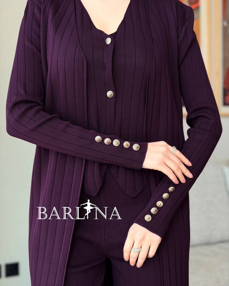 Burgundy formal suit with wide-leg trousers and a long jacket