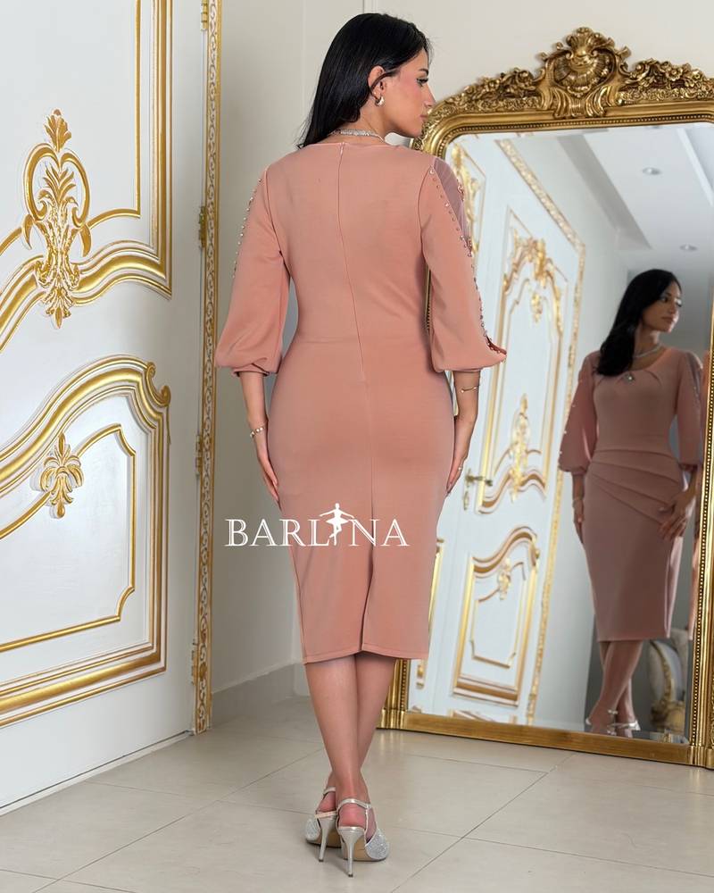 Short dress with pleats and sheer sleeves