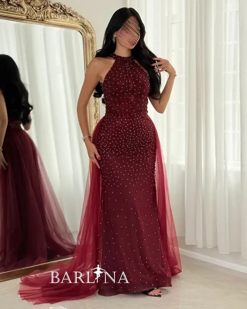 Burgundy embroidered evening dress with a train