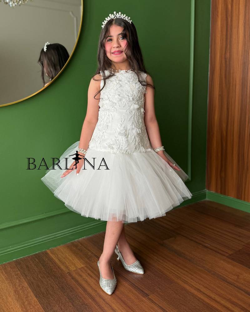 White girl's dress with elegant embroidery