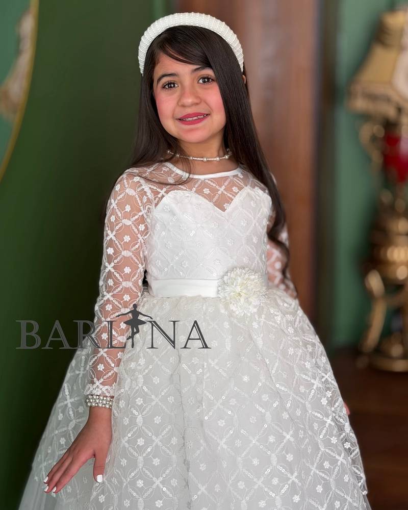 white girl's dress with sheer decorative sleeves