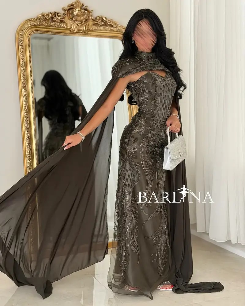 Dark brown dress with luxurious details and a cape