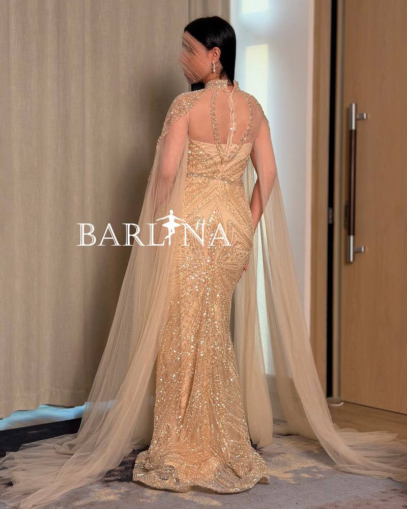 Gold evening dress embroidered with crystals and sequins