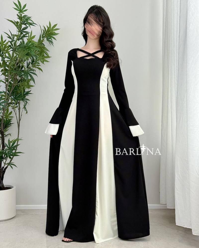 A soft, black and white dress with a flared cut