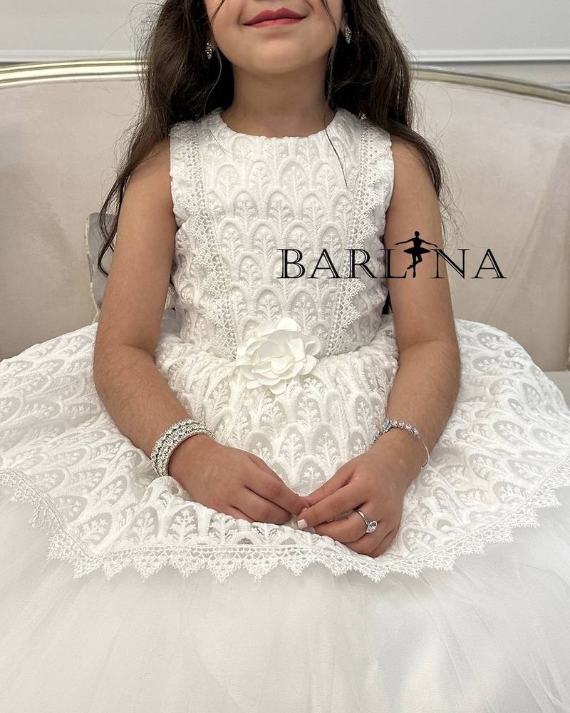 Girls white dress with lace patterns