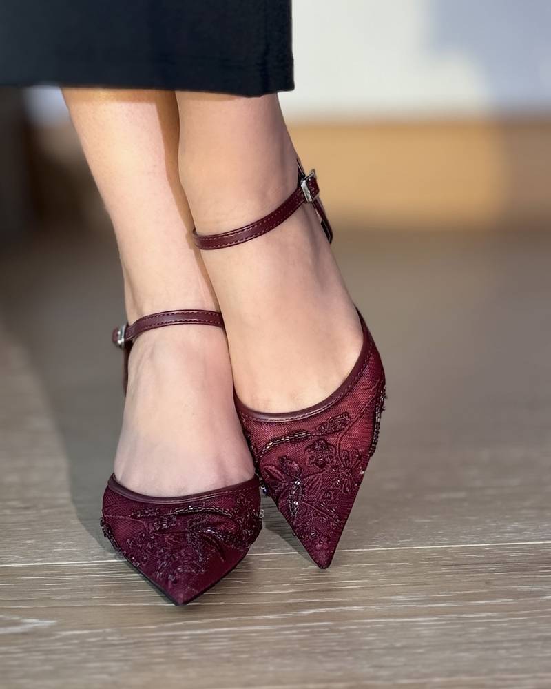 Elegant transparent women's heel with a thin strap