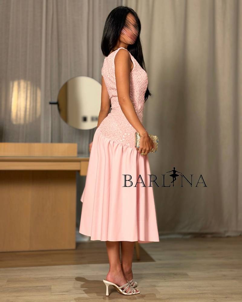 feminine pink midi dress with shimmering details