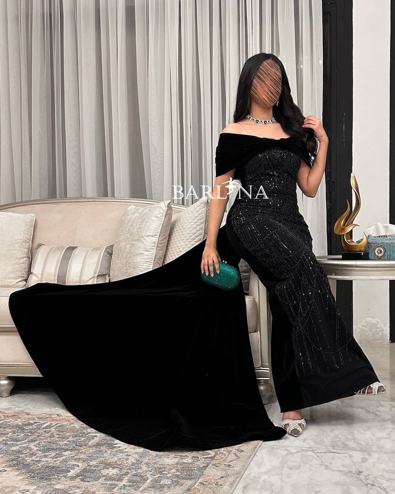 Black evening dress with shiny details