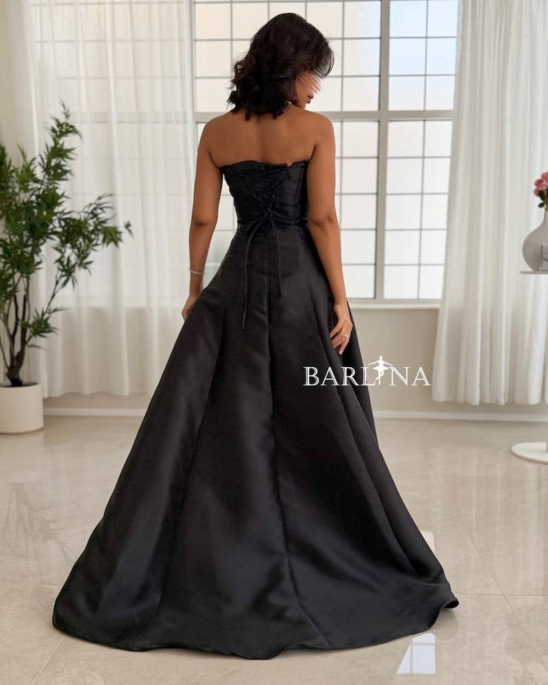 Black evening dress with purple flowers