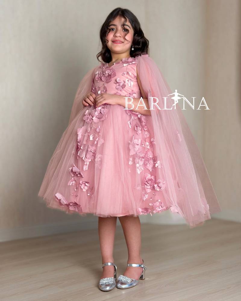 Pink girl's dress with rose details and tulle layers