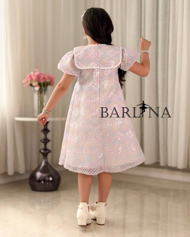 Pink girl's dress with a bow-decorated collar
