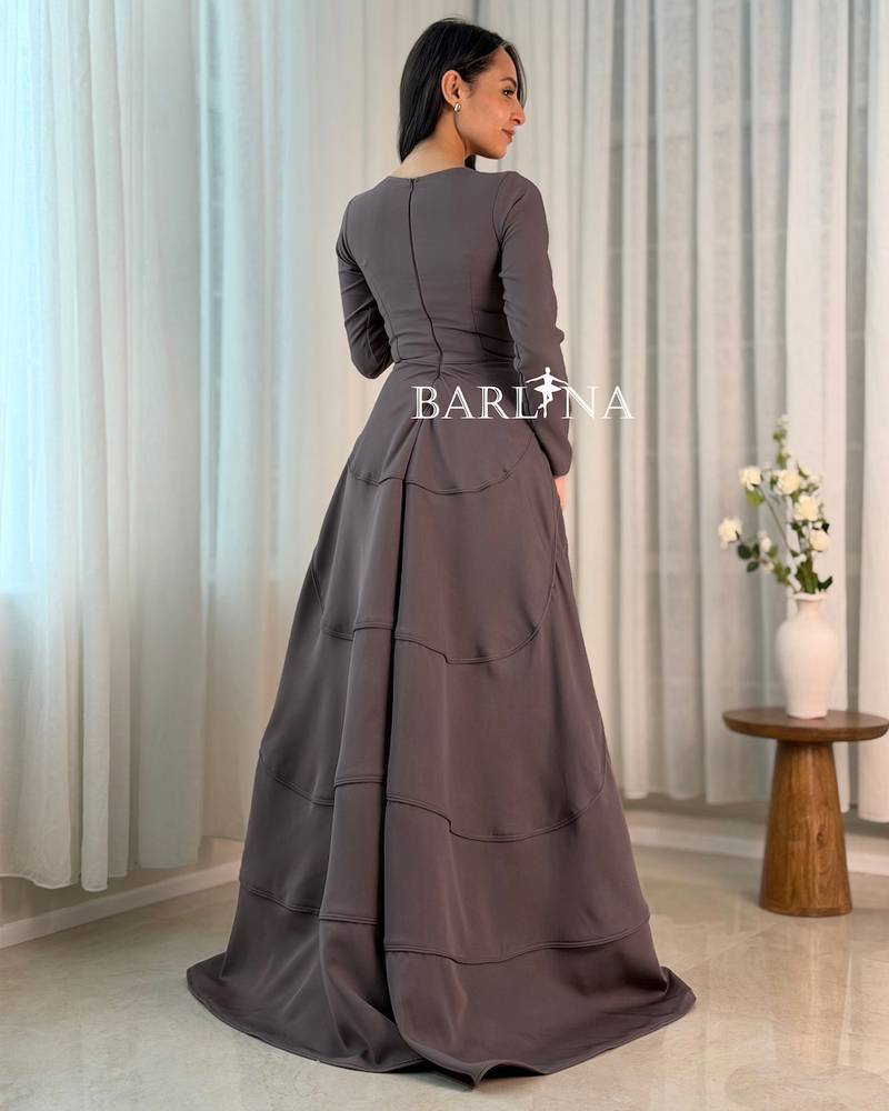 Elegant dress with a modest design and long sleeves