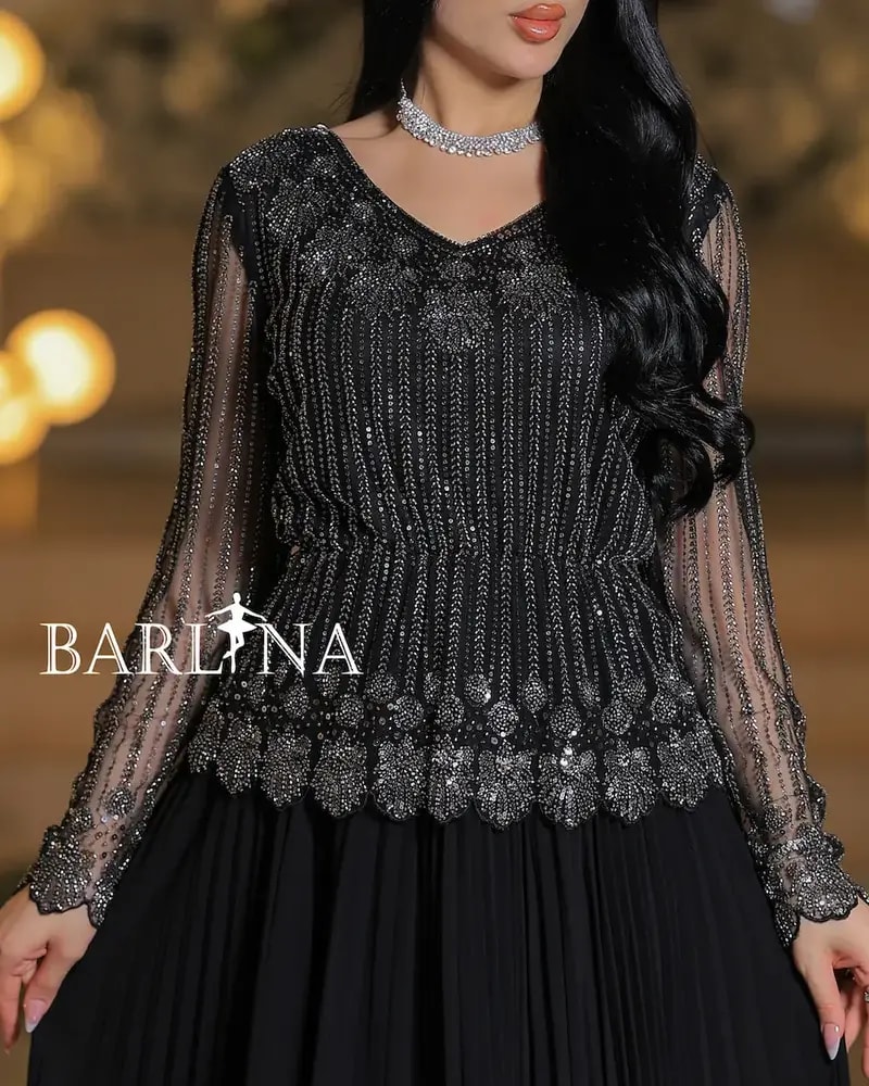 Luxurious dress with elegant sheer sleeves