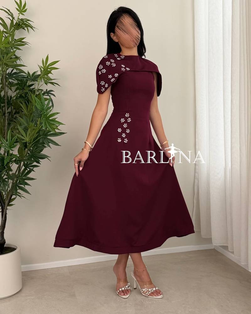 Burgundy dress with short sleeves and crystals