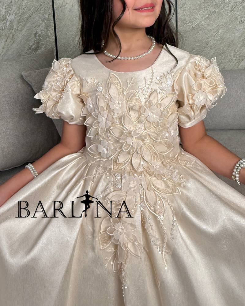 Girls' light beige dress decorated with elegant flowers