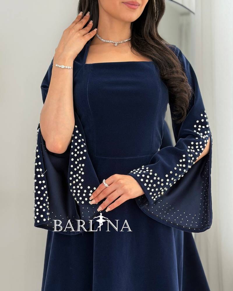 Navy blue velvet dress embroidered with pearls