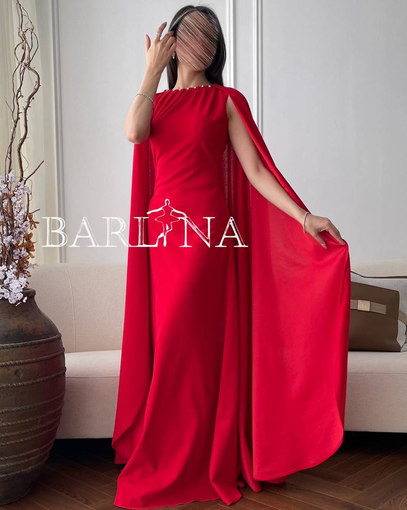 Long red evening dress with cape and crystals