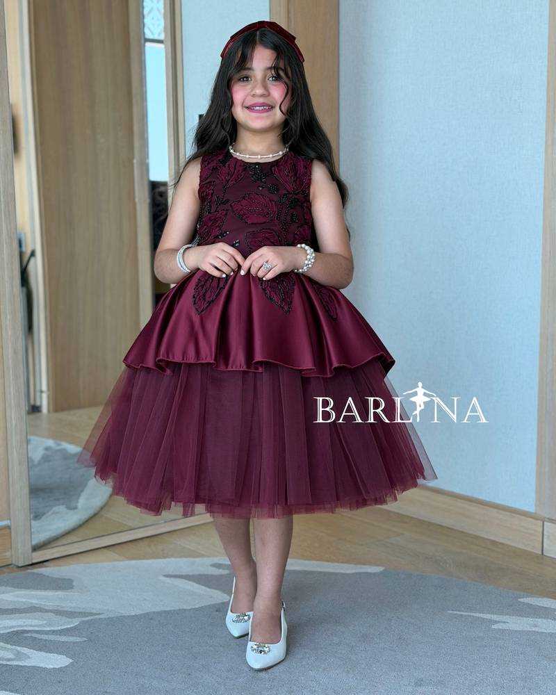 Girls' burgundy dress with a fluffy tulle overlay