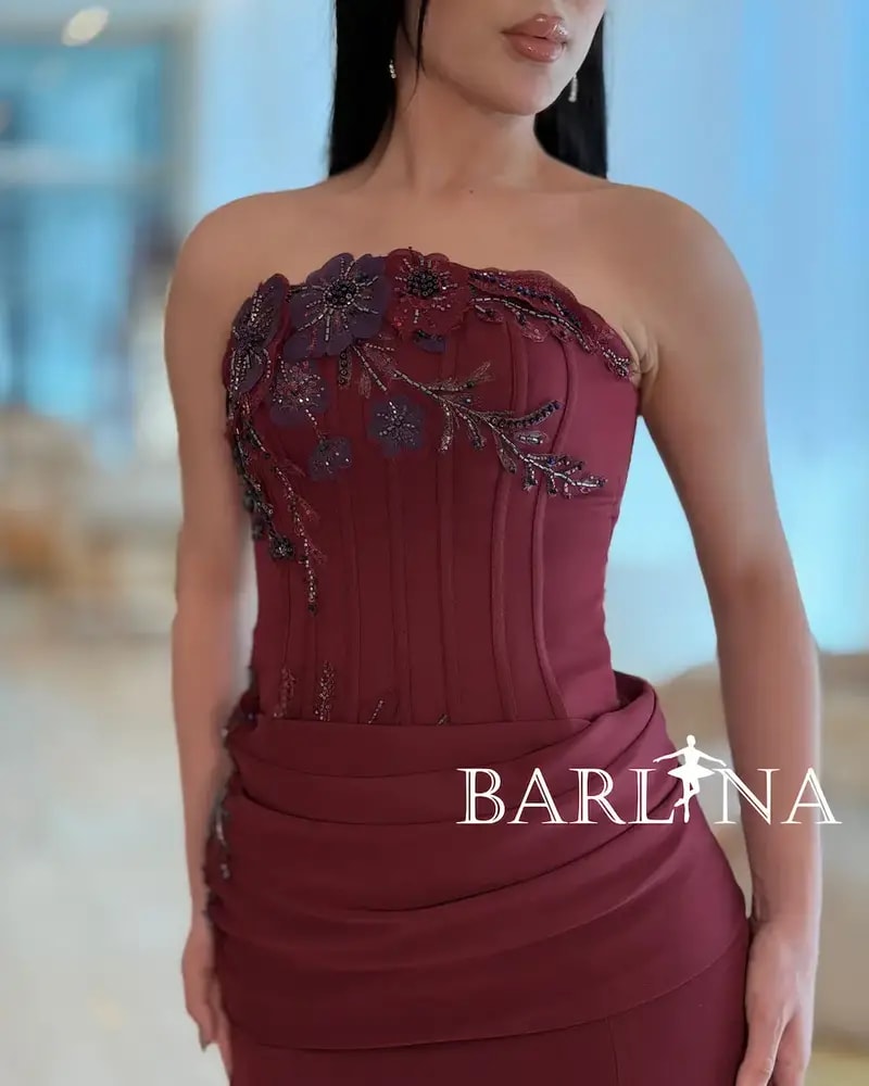 Burgundy dress with a corset design and wide cut