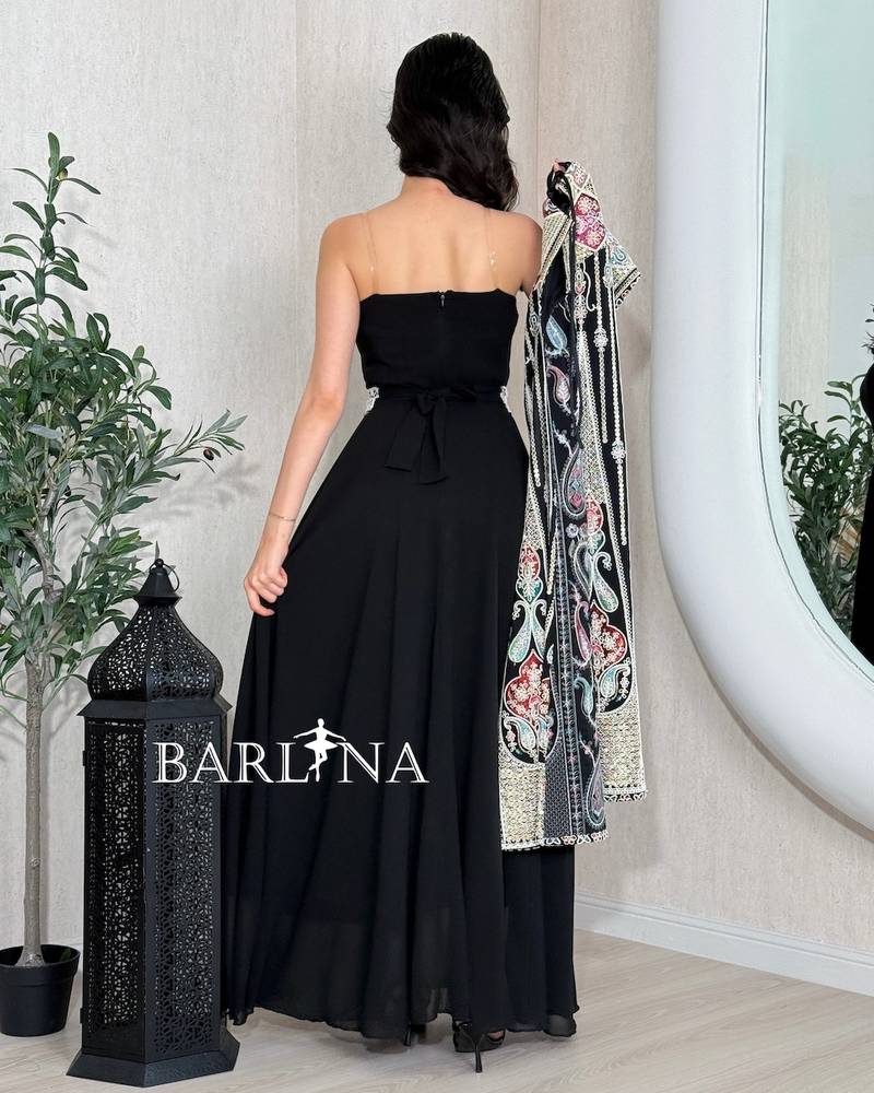 Black jalabiya with a separate embroidered cape