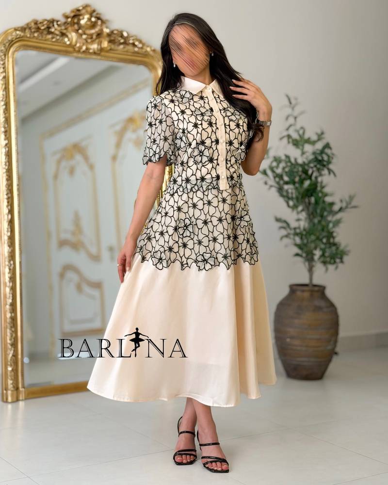 Beige midi dress with black floral embroidery
