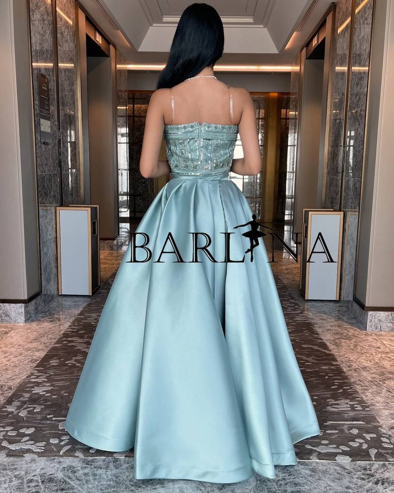 Two piece dress decorated with beads and pearls