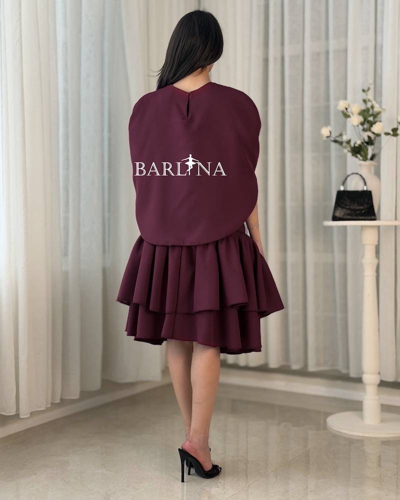 A short dress adorned with pearl details