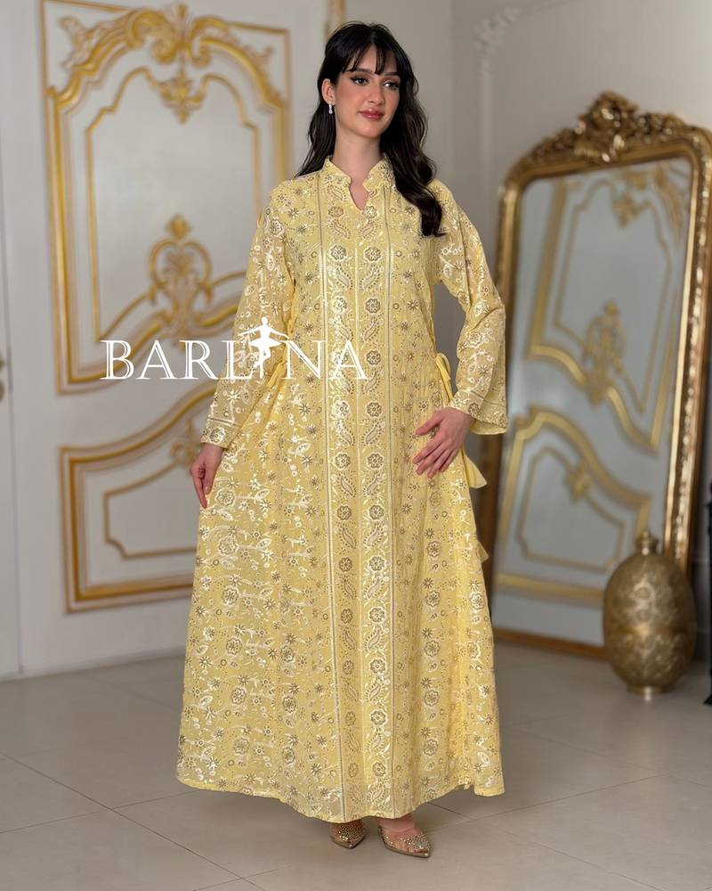 jalabeya with white embroidery and a side tie
