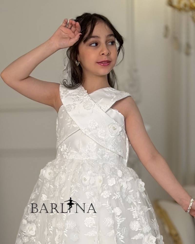 Soft white girls' dress with a cross-neck