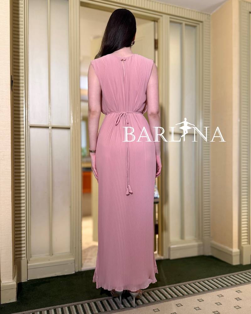 Soft pink pleated dress with belt