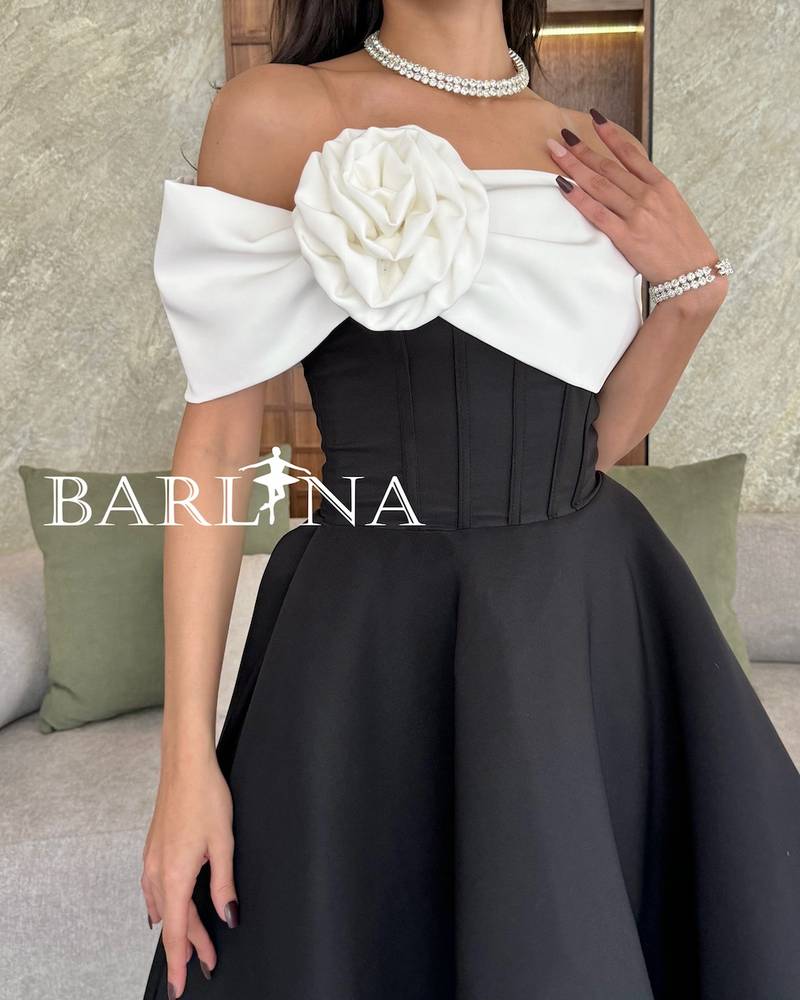 Black corset dress with white flower