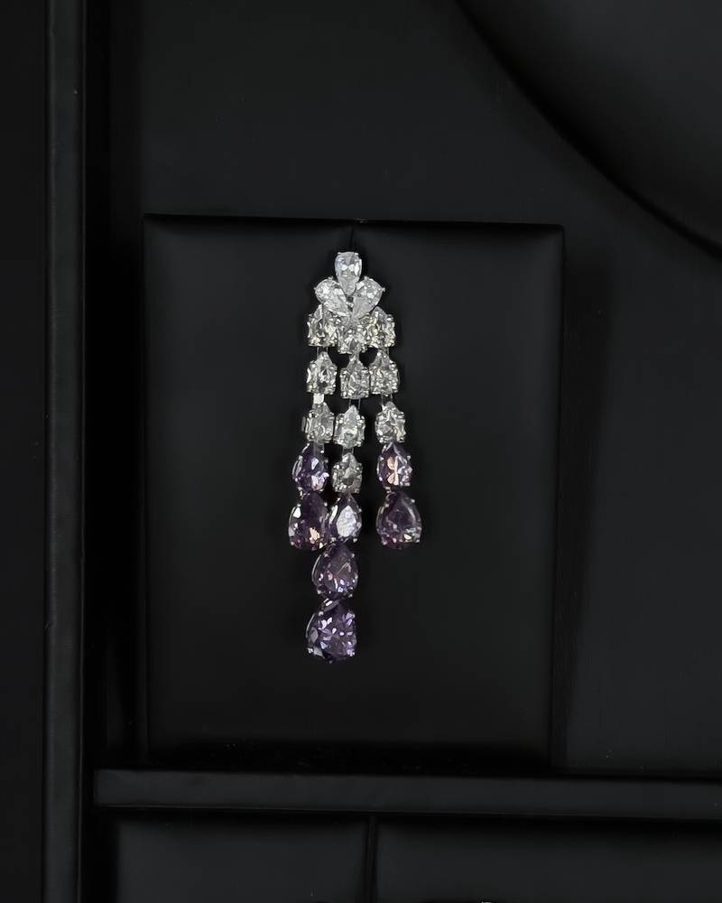 Modern accessory set with an open purple necklace