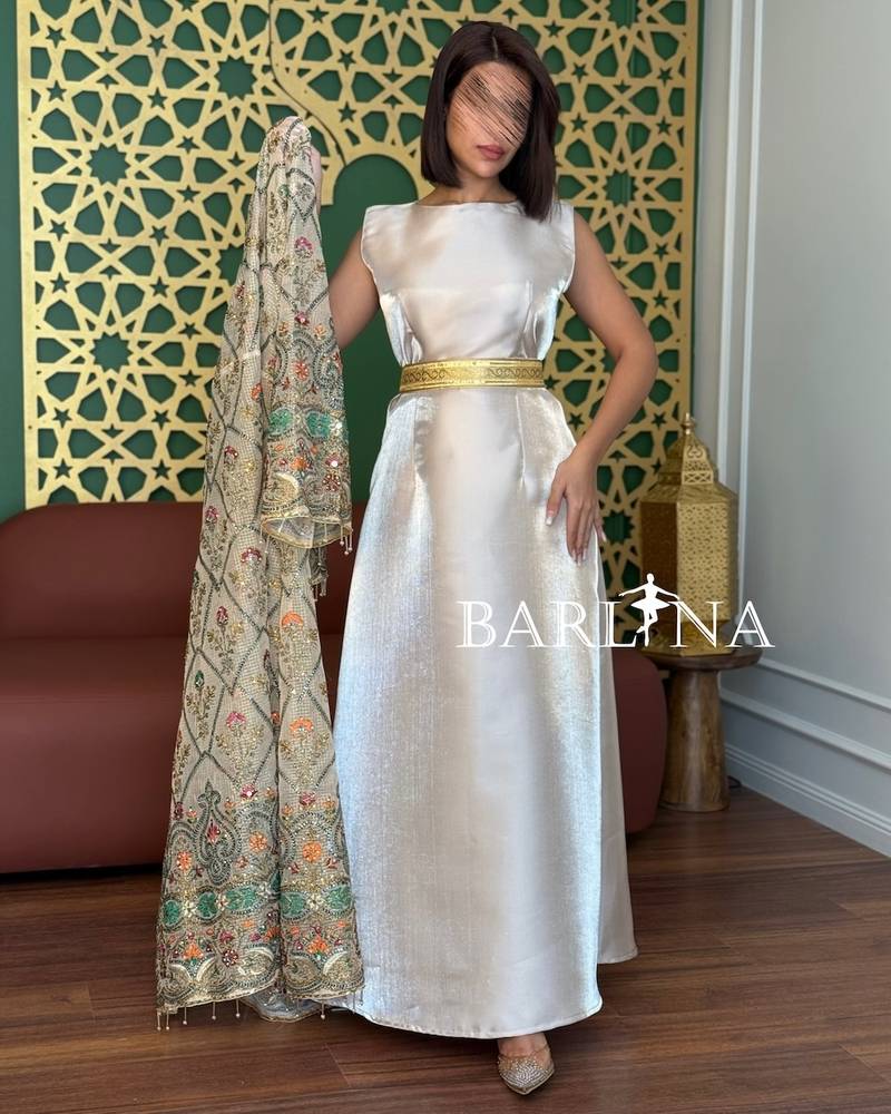 Off-white jalabiya with a decorative outer layer