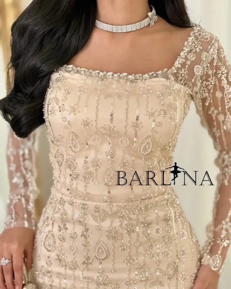 Beige evening dress with sparkling embroidery