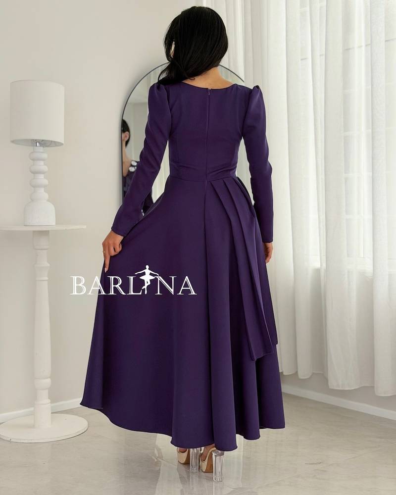 Purple dress with a V-neck and crystal embellishments